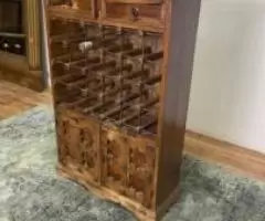 A solid wooden bar With 2 drawers and cabinets