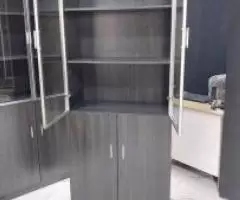 We're selling brand new office cabinets